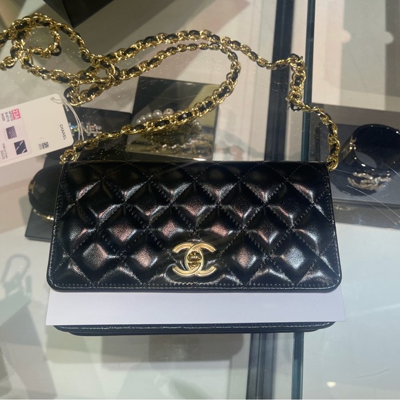 CHANEL Handbags - Chanel Black Quilted Crossbody with Gold Chain